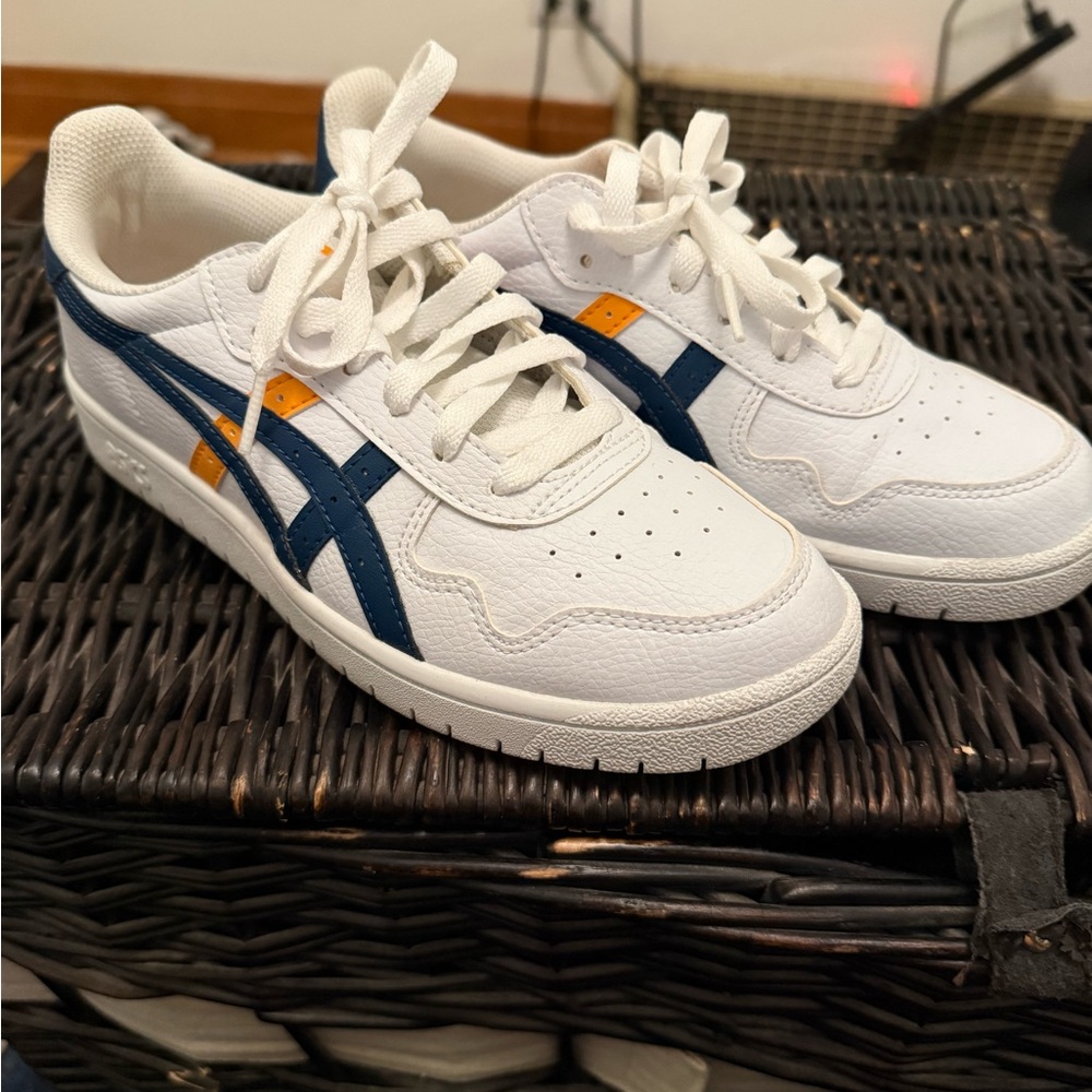 White Sneakers with Blue and Orange Accents